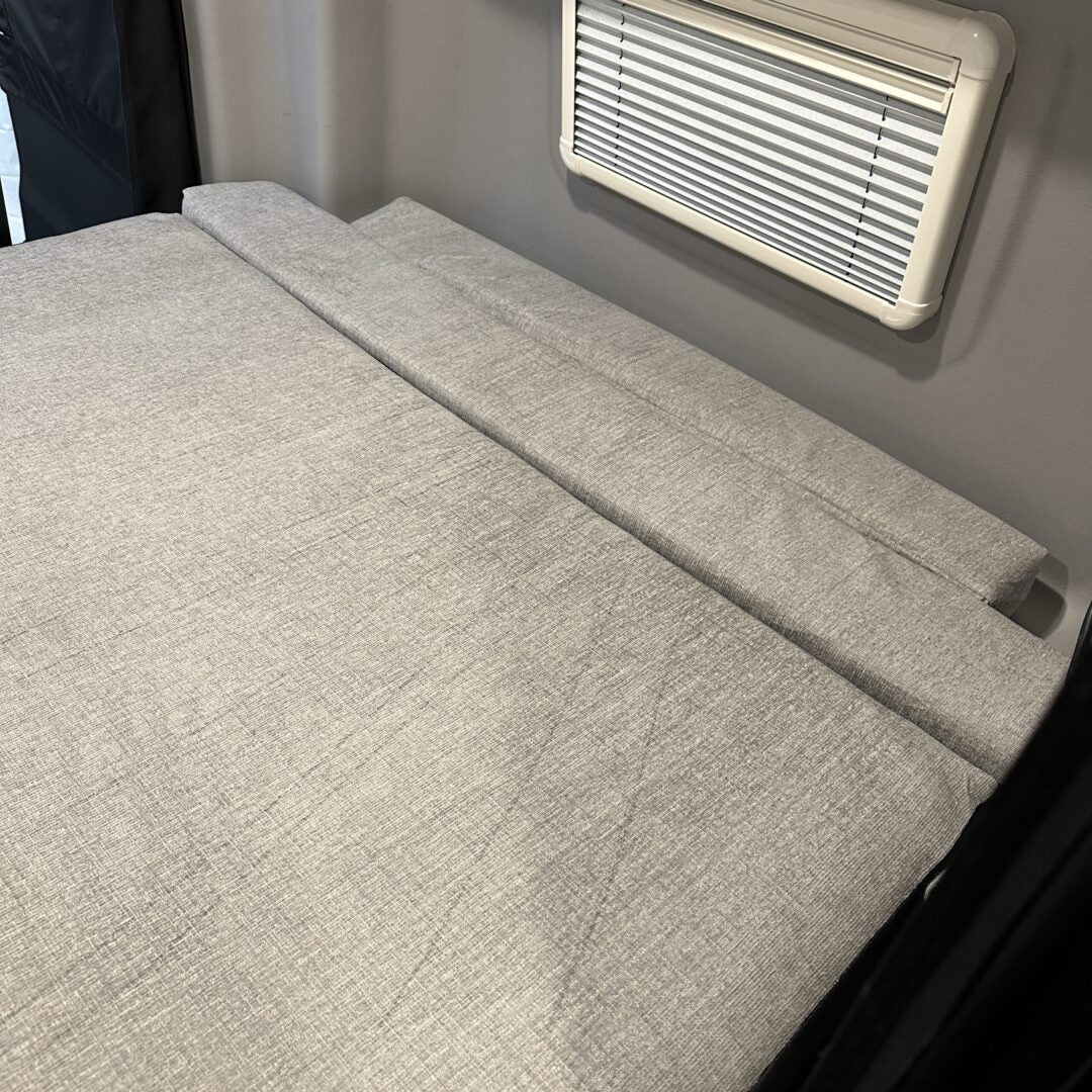 A Luxe6 Cool Gel Memory Foam 6" Mattress - Made for the REVEL/TERRAIN/LAUNCH on an RV bed with a fan.