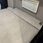 Luxe6 Memory Foam 6 Mattress laid flat in van interior with closed window shade