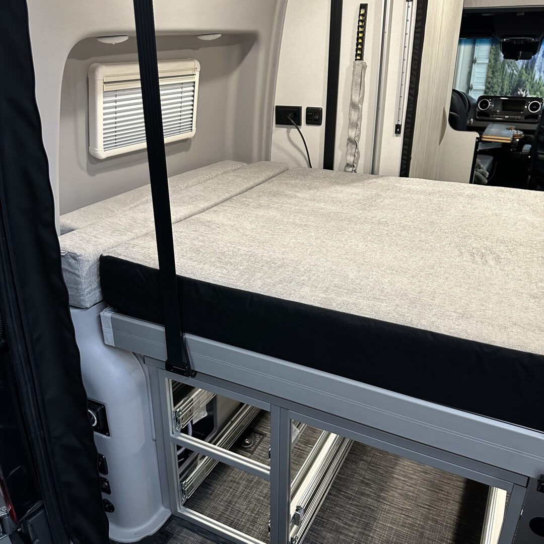 A van with a Luxe6 Cool Gel Memory Foam 6" Mattress - Made for the REVEL/TERRAIN/LAUNCH in the middle of it.