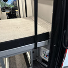 Luxe6 memory foam 6-inch mattress shown inside a van with platform bed setup
