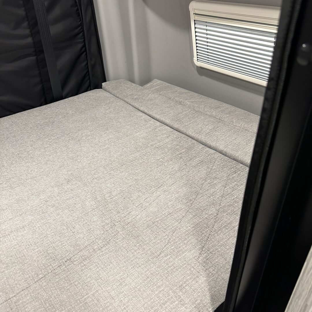 The inside of a camper with the Luxe6 Cool Gel Memory Foam 6" Mattress - Made for the REVEL/TERRAIN/LAUNCH.