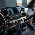 CAV D-ash Tray Pro installed in van dashboard with carbon fiber finish and organized tray space