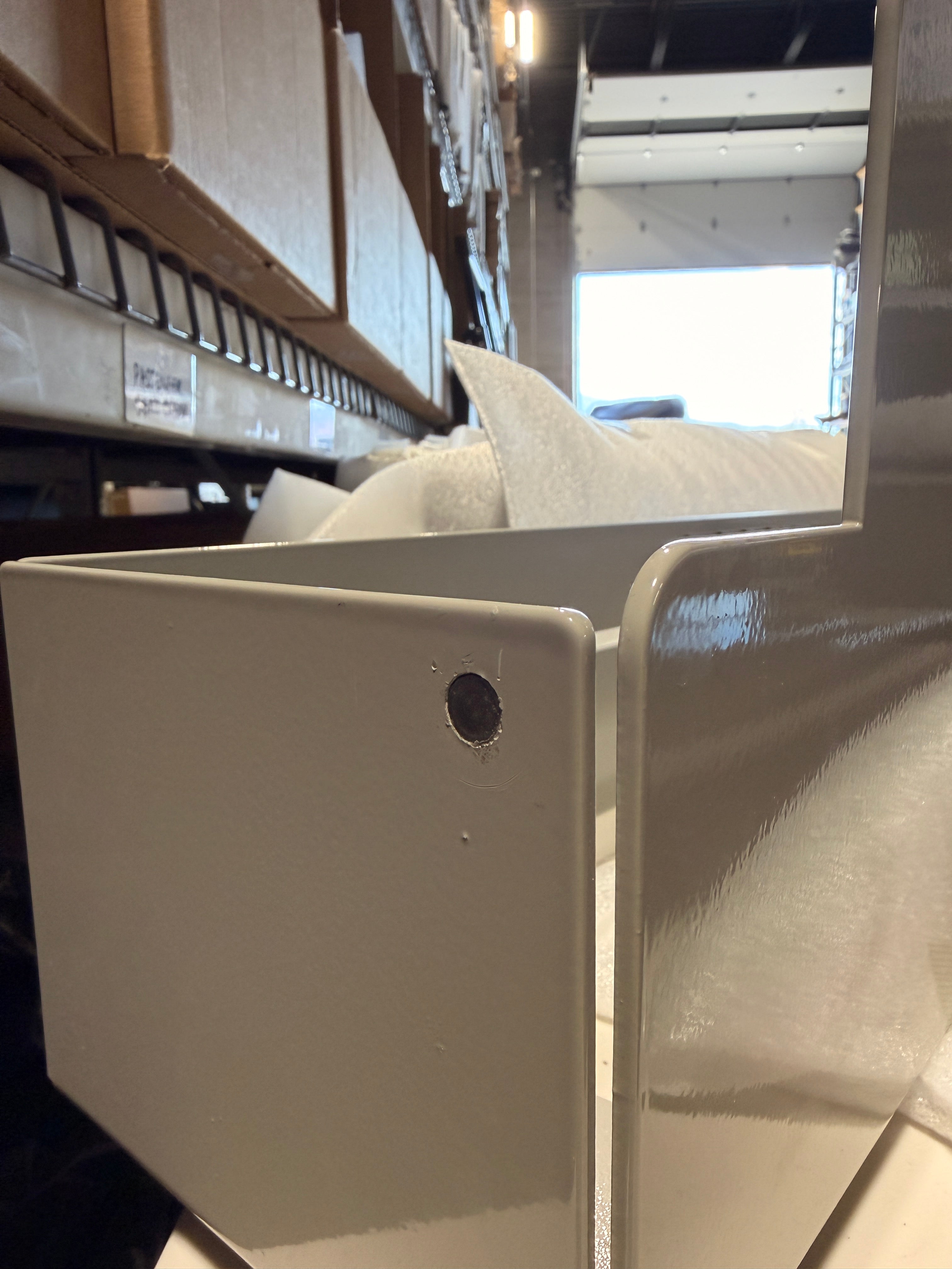 Grey Last Chance bed riser photo showing the raw metal screw blemish.