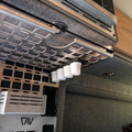 CAV Canyon Keurig holder mounted under van cabinet with four coffee pods in place