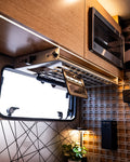 Rossmonster Driver Undercabinet Shelf installed in a van interior