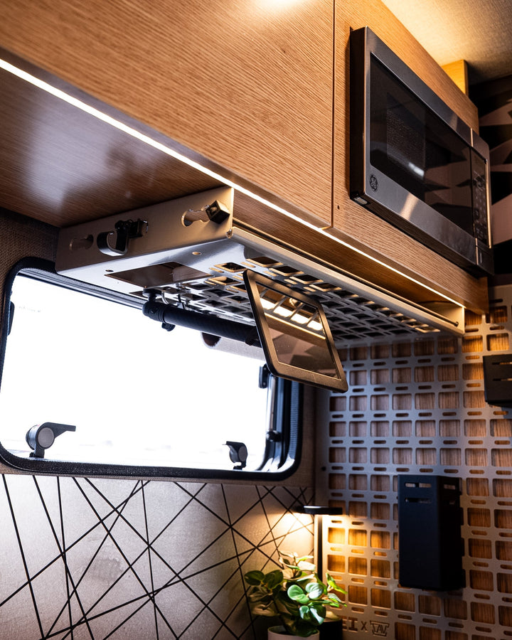 Rossmonster Driver Undercabinet Shelf installed in a van interior