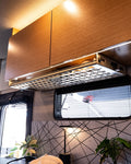 Rossmonster Passenger Undercabinet Shelf installed in a van interior