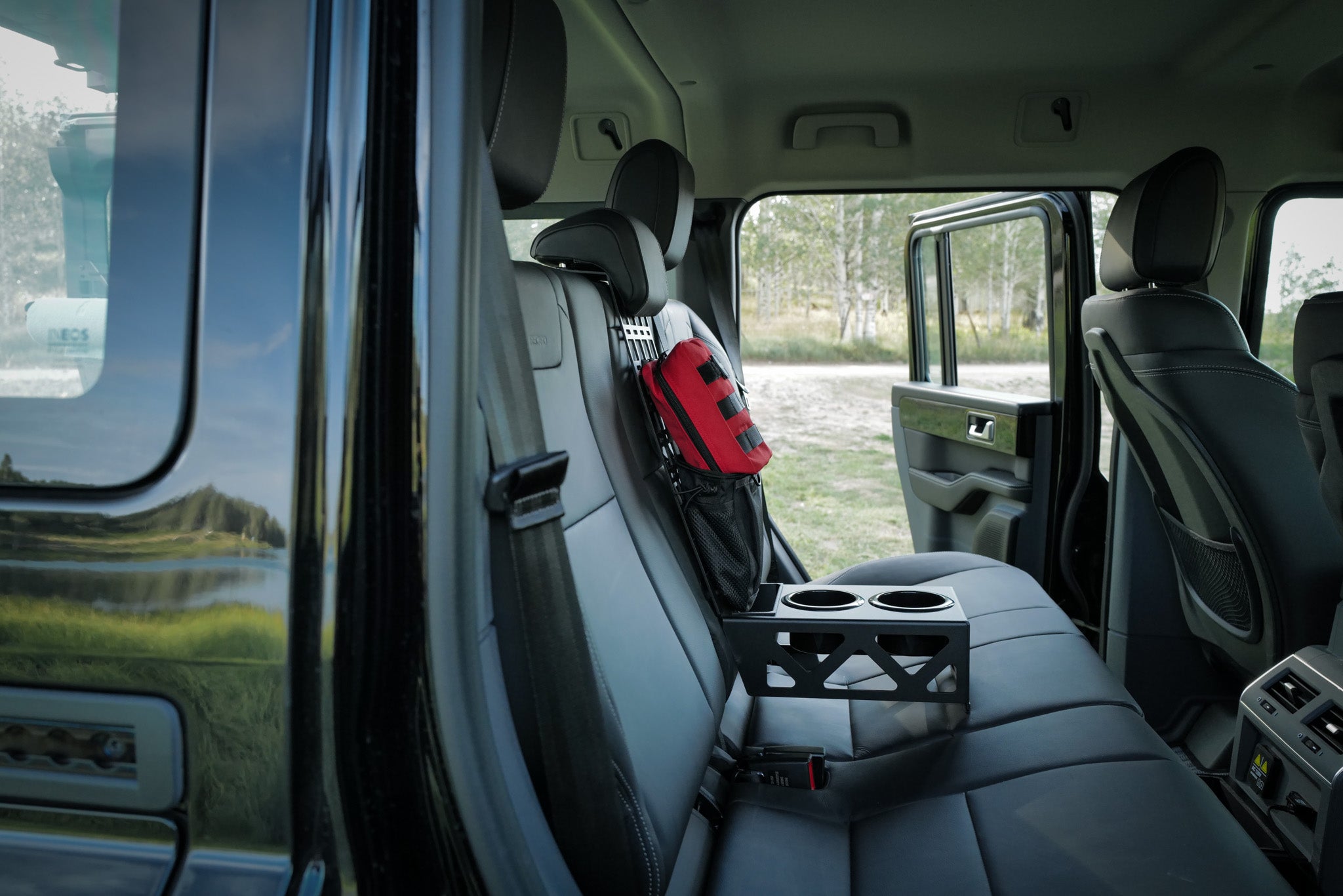 INEOS Grenadier rear cup holder with phone storage