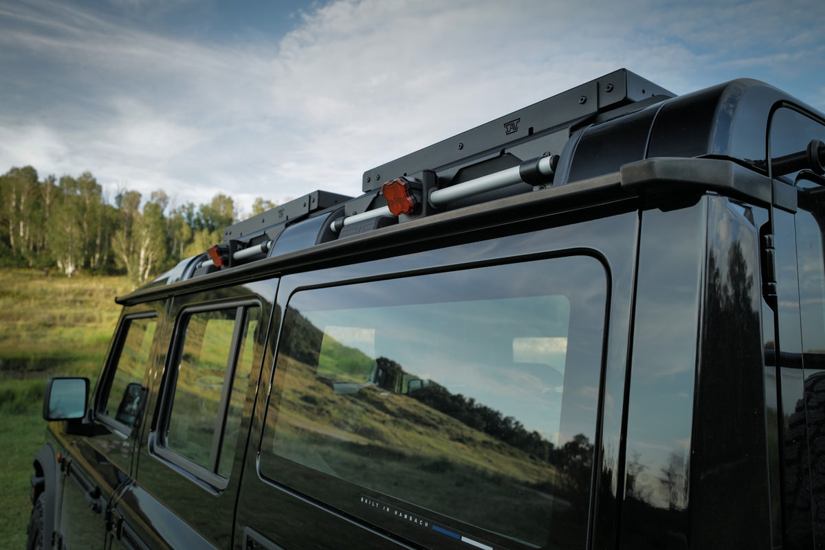 INEOS Grenadier + Quartermaster Roof platform mounted to the grab handles