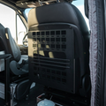 CAV Seat Backpack mounted on the back of a van seat with grid-style storage design