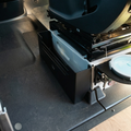Canyon Passenger Seat Cubby installed under a van seat with storage drawer open