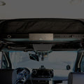 Cab Shelf TV Bracket by Van Wife Components mounted above the driver area in a van.