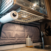 Ekko under cabinet shelf holding paper towel above van sink and soap dispenser