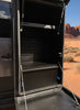 Canyon Drawer System by VanWife in rear van storage area with desert landscape in background