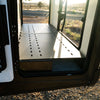 canyon ekko garage platform installed in winnebago ekko mercedes sprinter van for storage shows with doors open