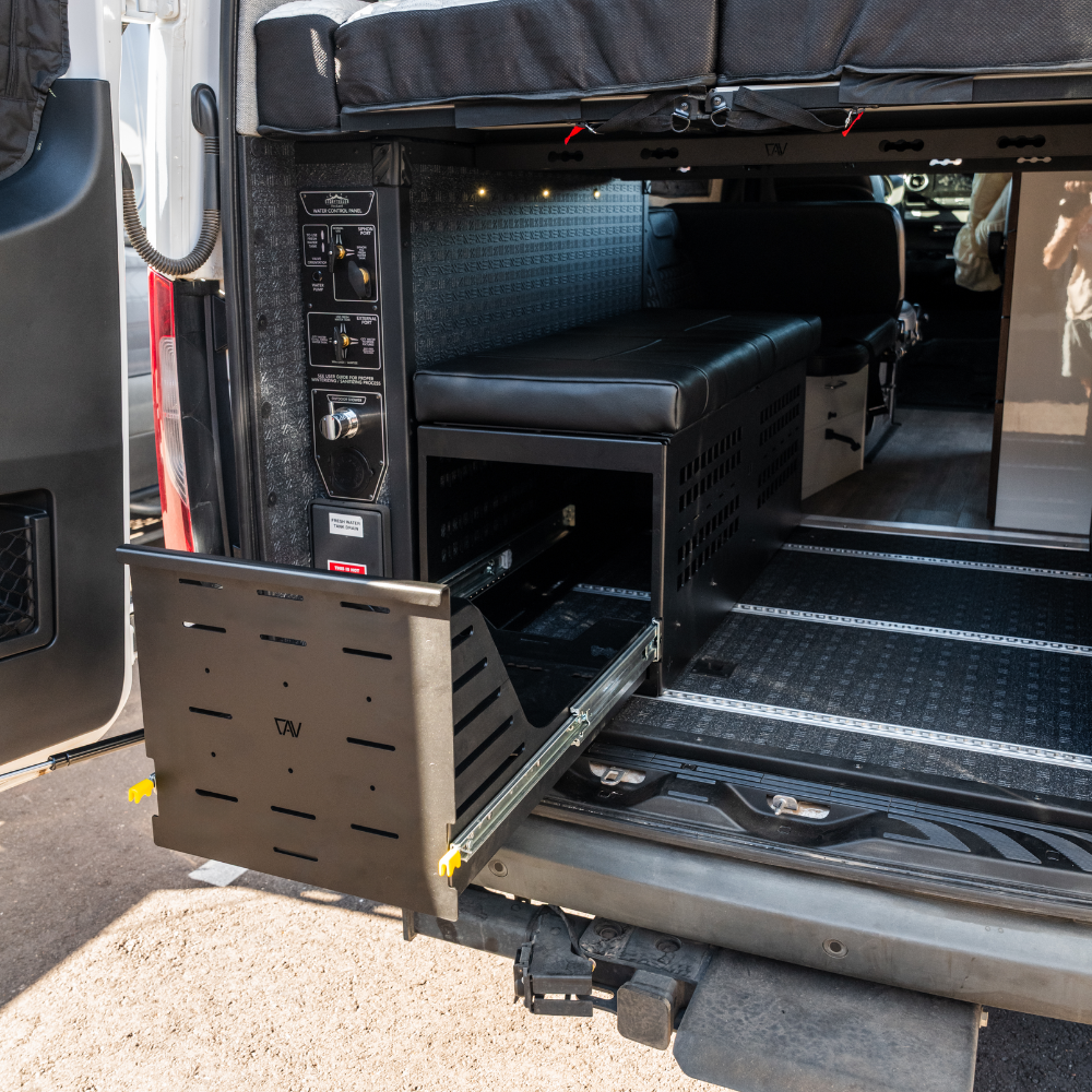 GLSS Cargo Tray Slide extended from van storage unit in Storyteller van interior