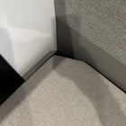 Corner view of the Groove Lounge Mattress Topper installed in a Storyteller van interior.