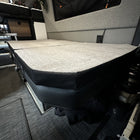Groove Lounge Mattress Topper for Storyteller van with gray fabric and black sides