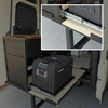 Used deck hitch support with Dometic fridge on sliding tray inside van cargo area
