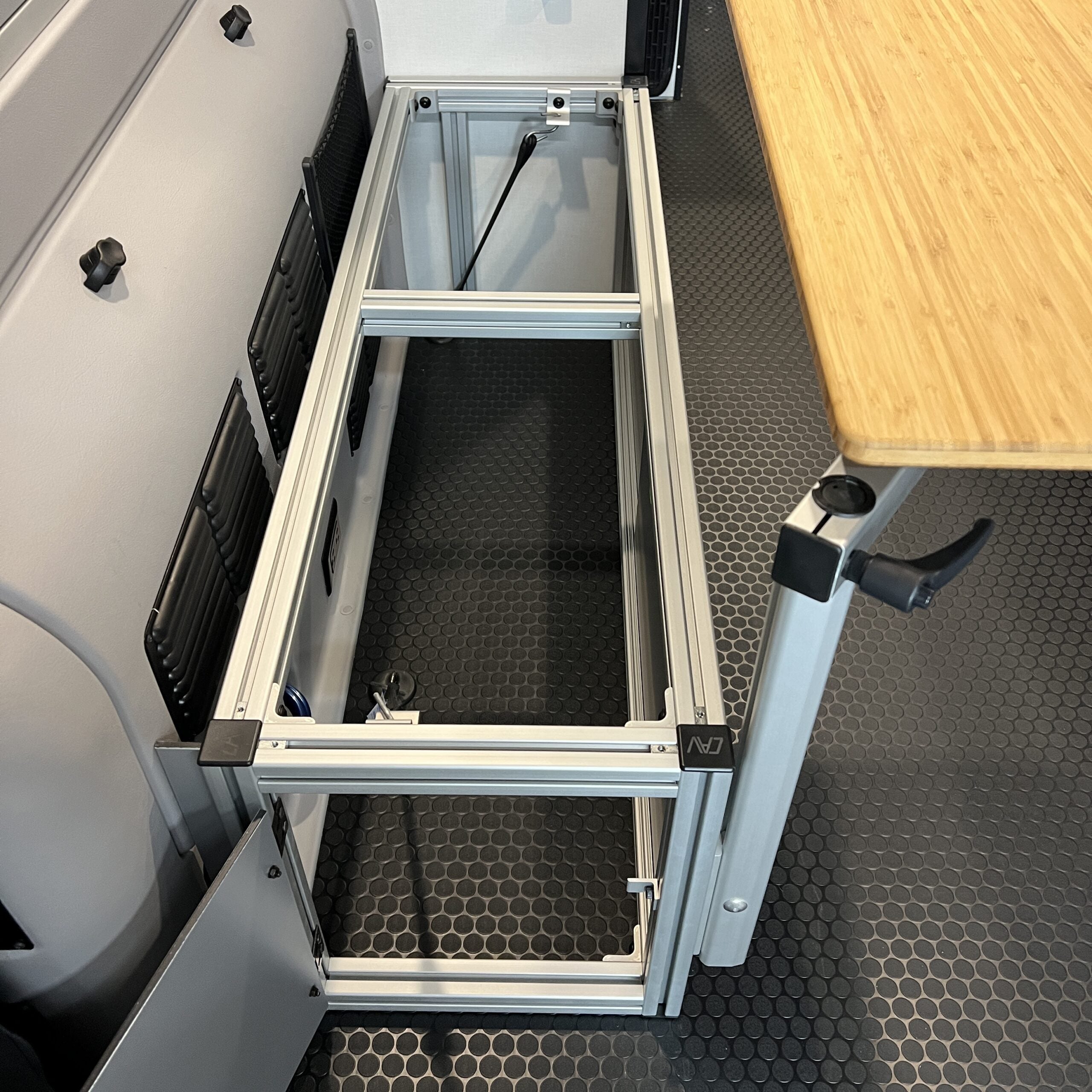 The 2021+ GLSS™ GARAGE LOUNGE STORAGE SYSTEM / DRIVER SIDE ONLY made for the 2021+ REVEL Patent Pending