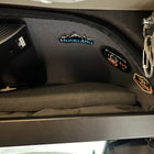 RoamRig headliner shelf bundle installed in a Sprinter van, showing storage space and mounted patches.